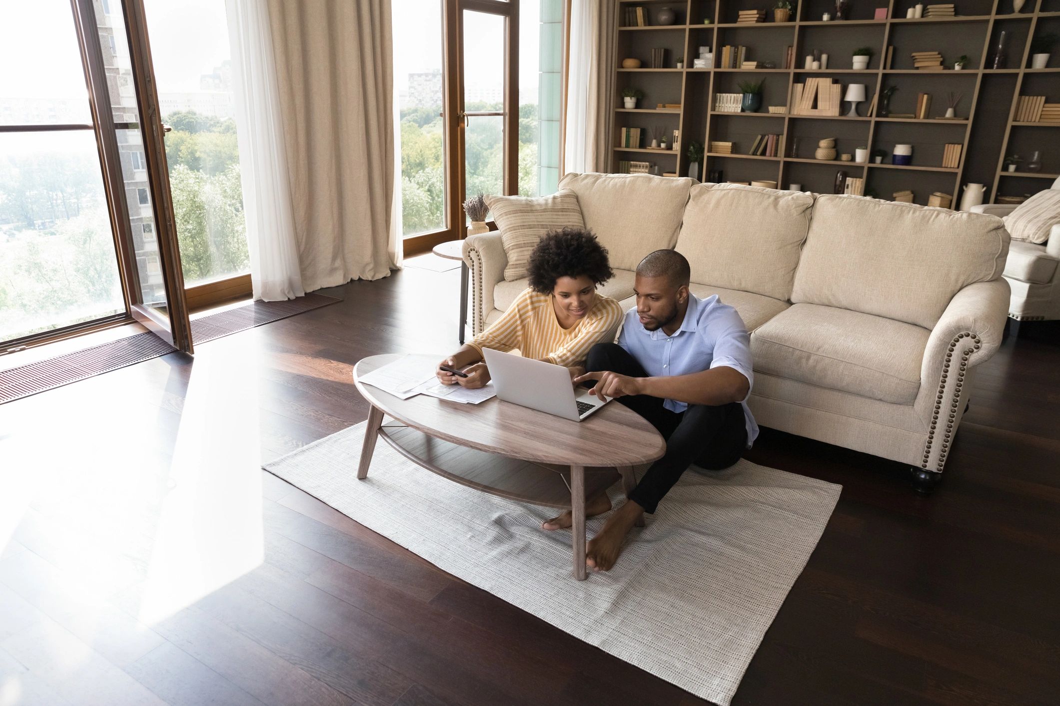 Couple reviewing finances together at home